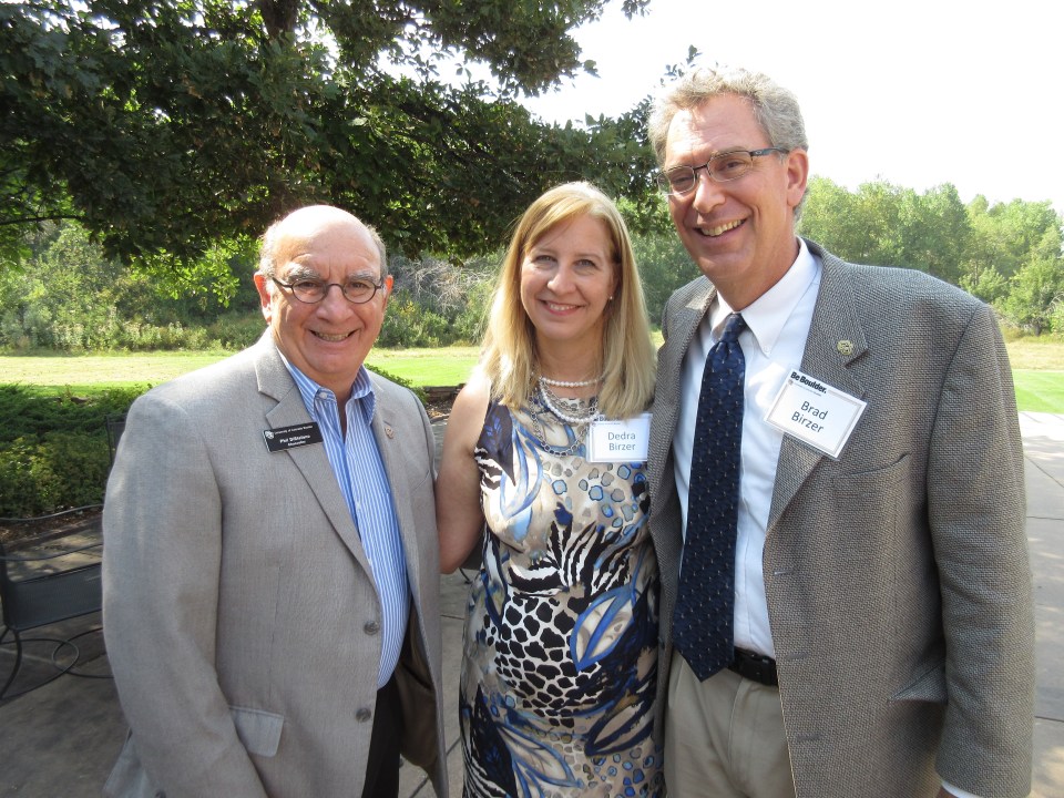 CU Chancellor Phil DiStephano, my beautiful wife, Dedra, and me.